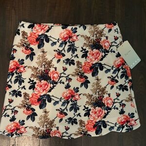 Lily White women’s Medium cream/floral skirt.